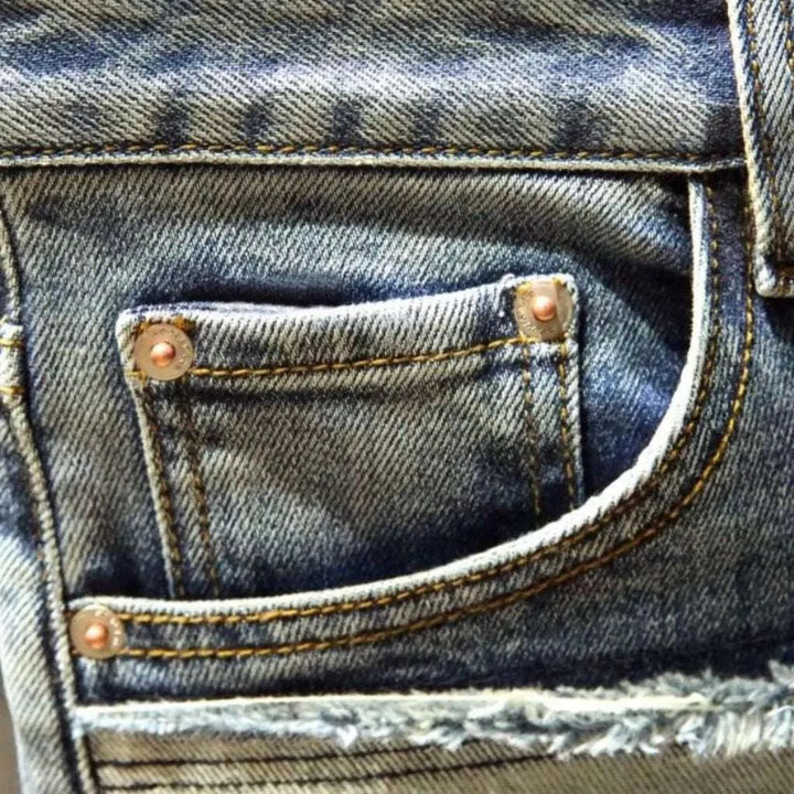 Mid-waist men's reworked jeans