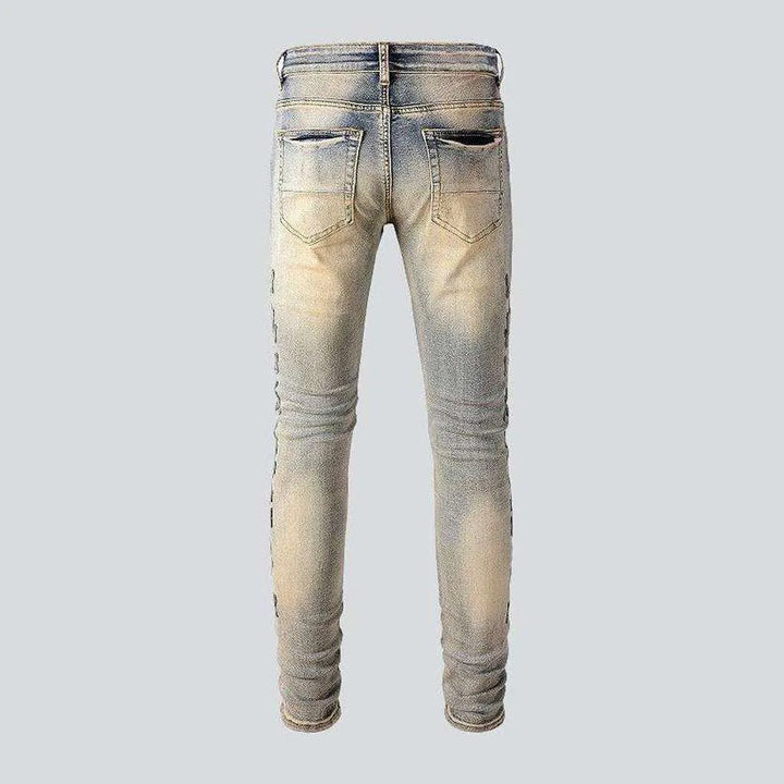 Leather bones embroidery men's jeans