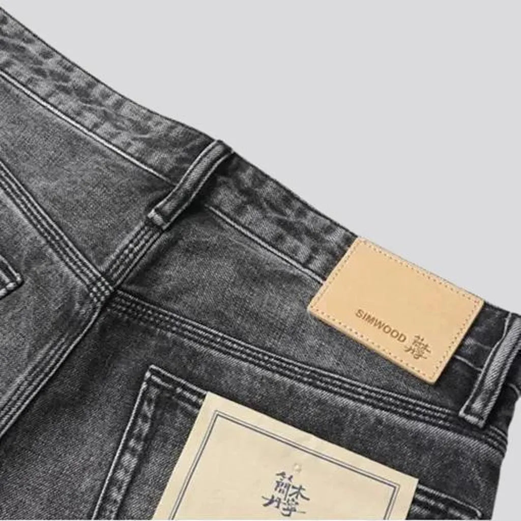 Grunge style vintage whiskered men's jeans