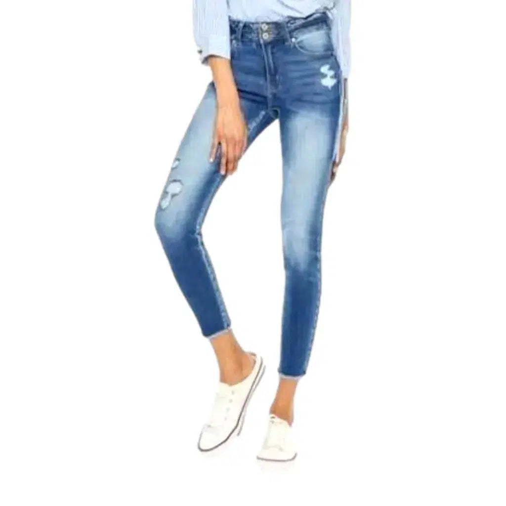 Cutoff-bottoms distressed jeans
 for women