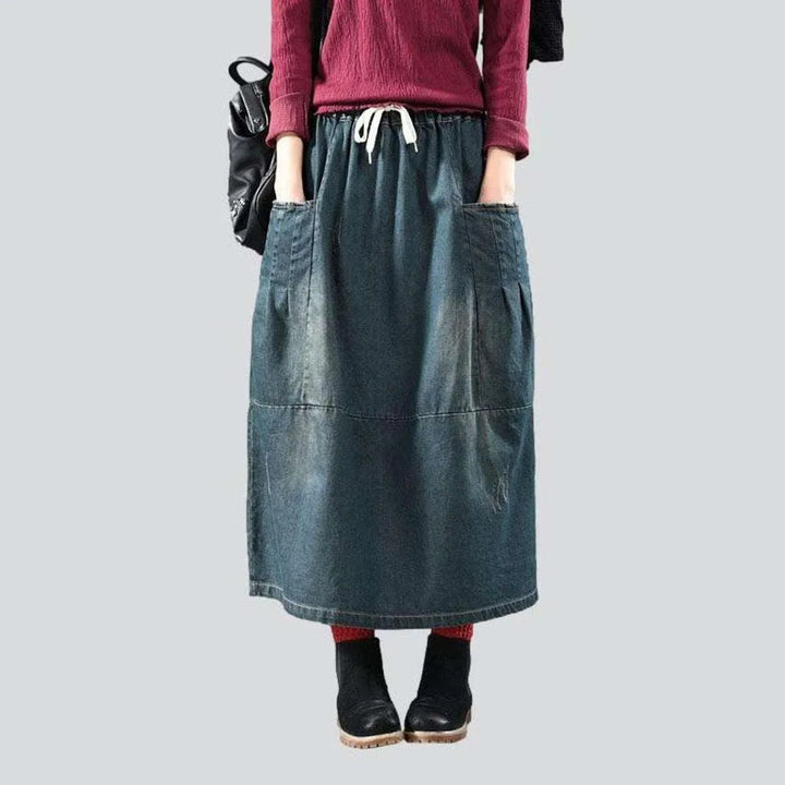 Long dark women's denim skirt