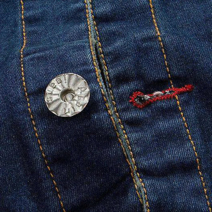 Rivet embellished embroidered denim jacket
