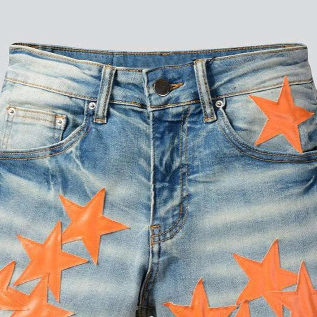 Orange stars embroidered men's jeans