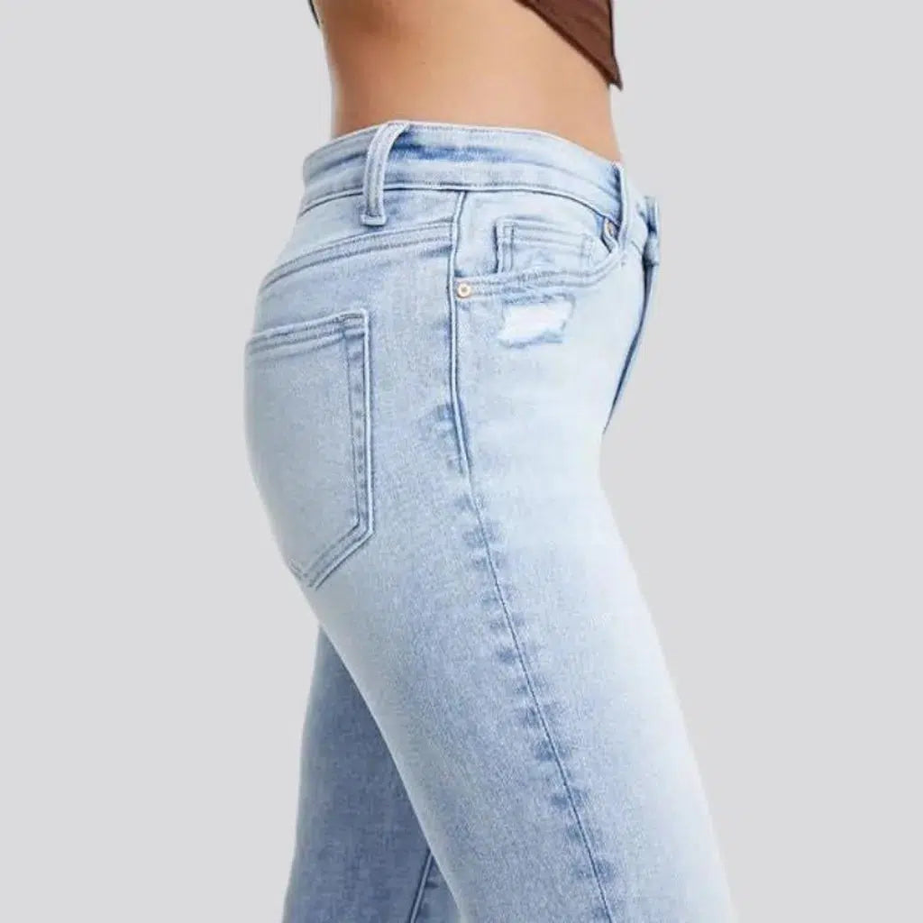 Whiskered women's light-wash jeans