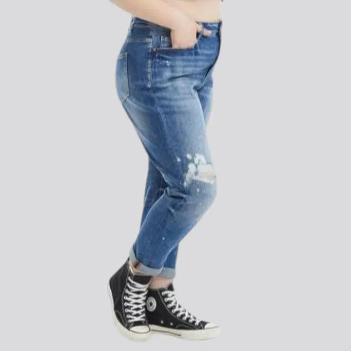 Distressed whiskered jeans
 for women