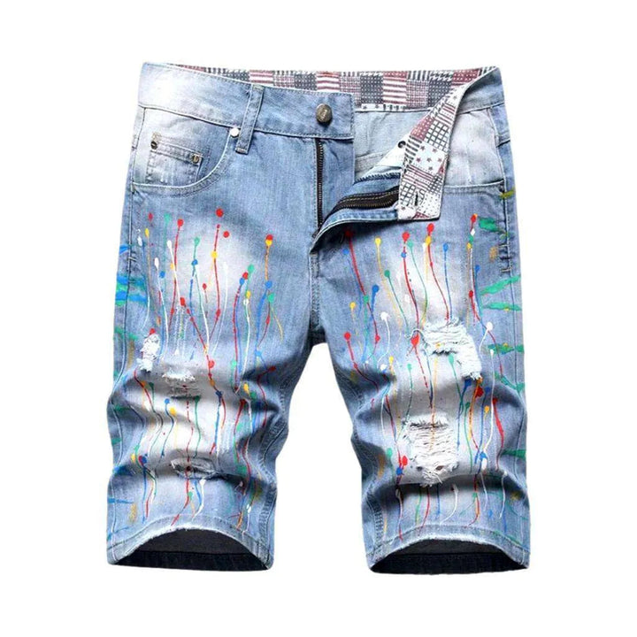Denim shorts with paint splatters