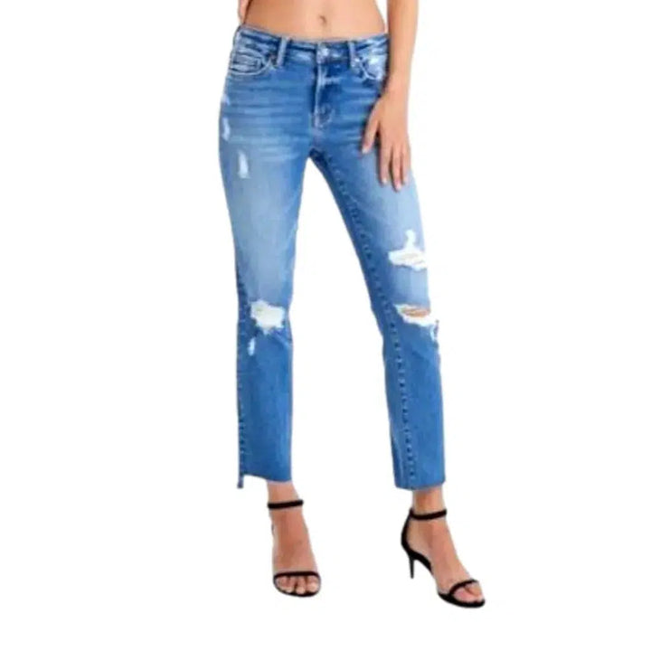 Distressed ankle-length jeans
