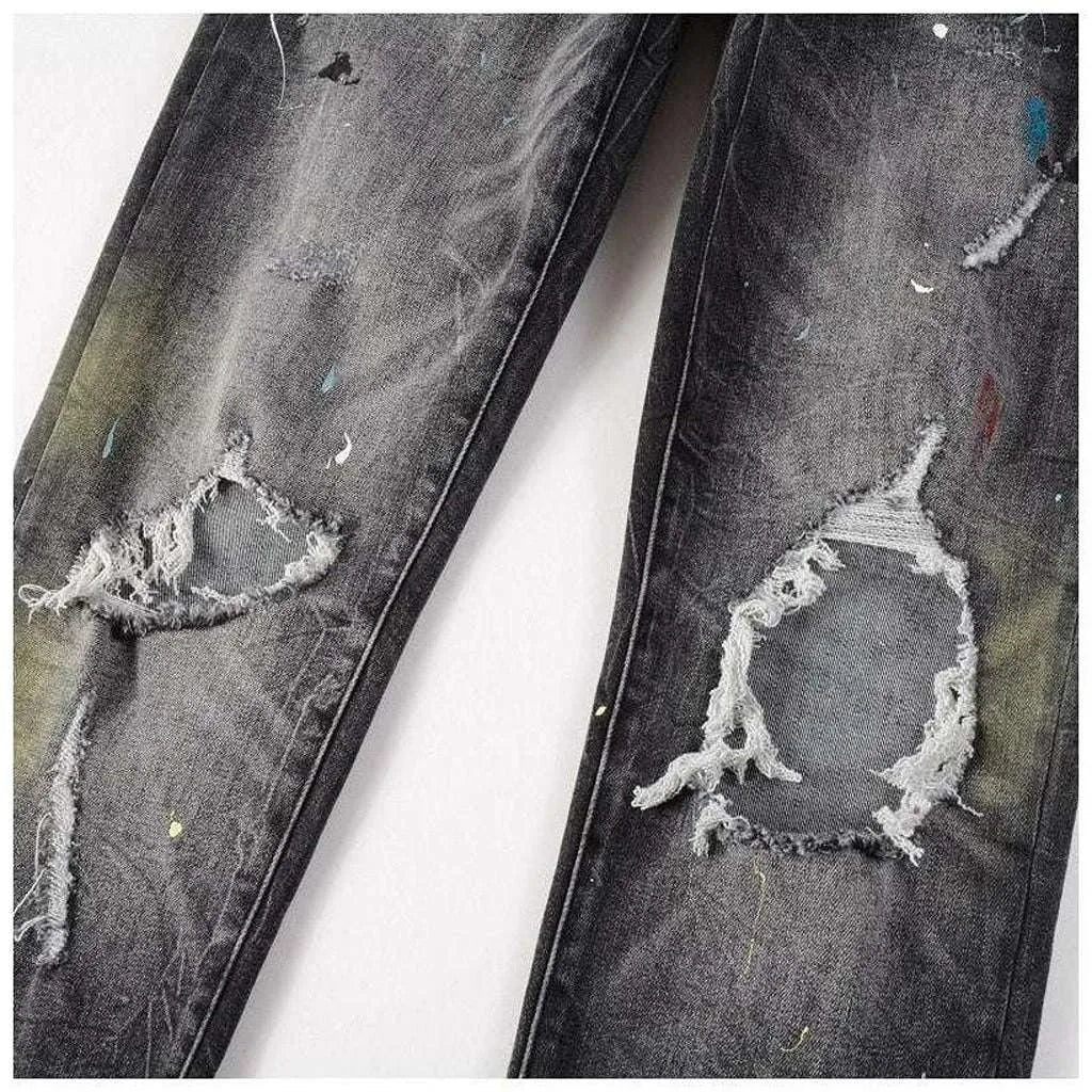 Distressed knees painted men's jeans