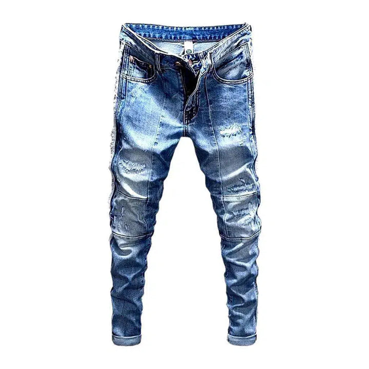 Distressed men's sanded jeans