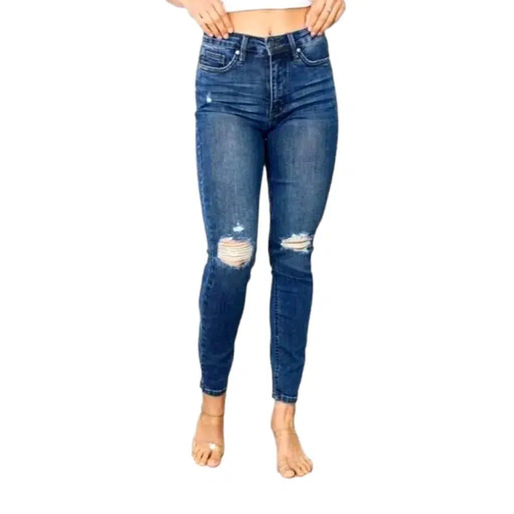 Distressed women's jeans