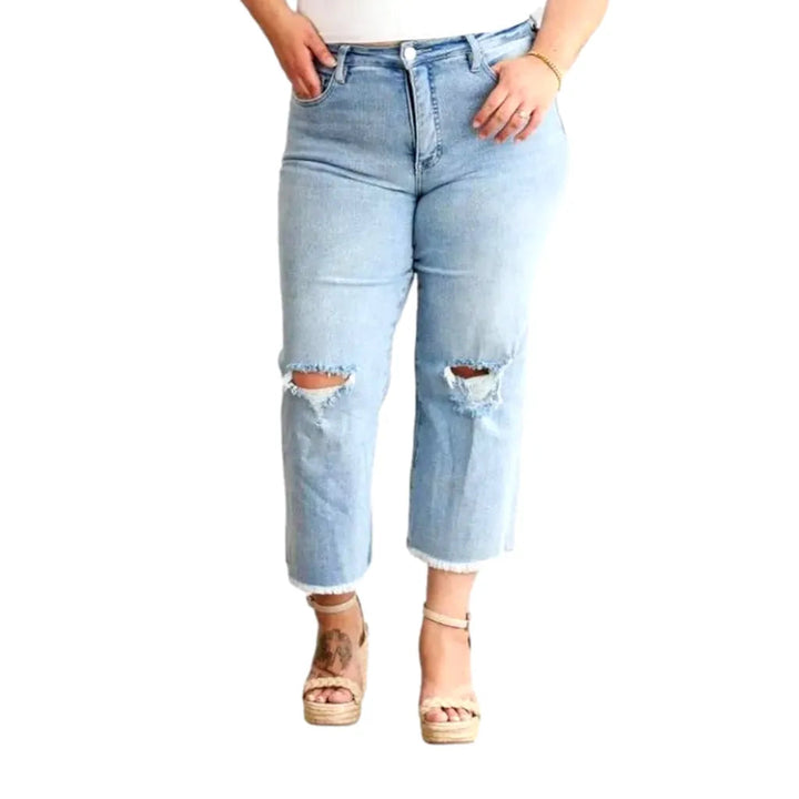 Distressed women's raw-hem jeans