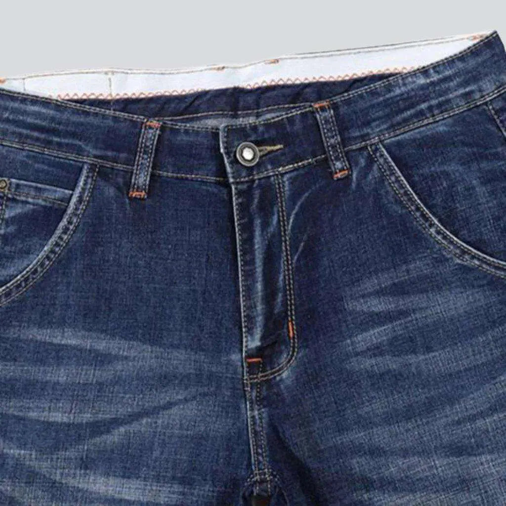 Whiskered medium wash men's jeans