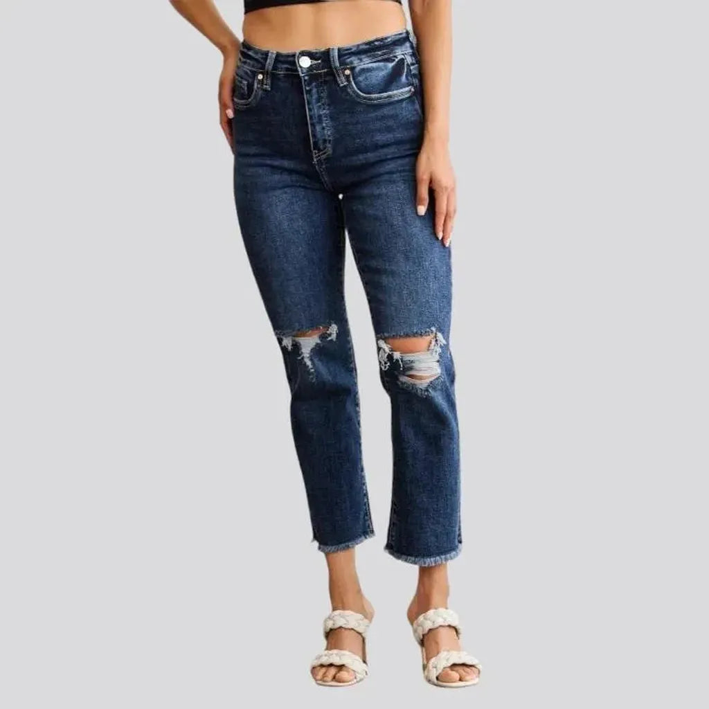 Frayed women's high-waist jeans