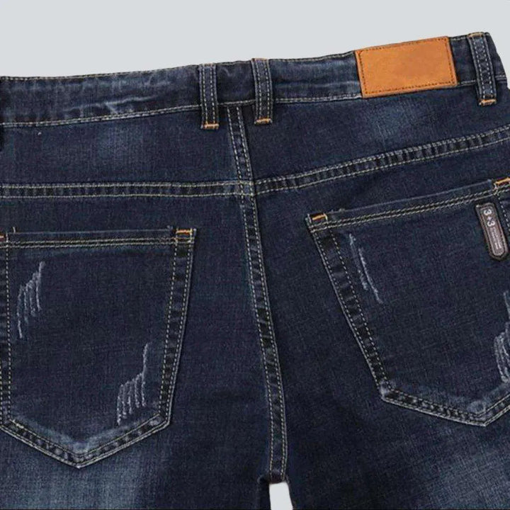 Dark wash sanded men's jeans