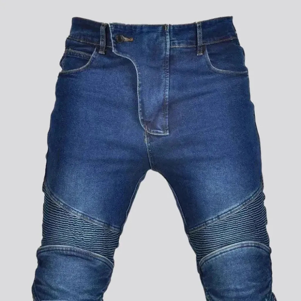 Slim stonewashed motorcycle jeans