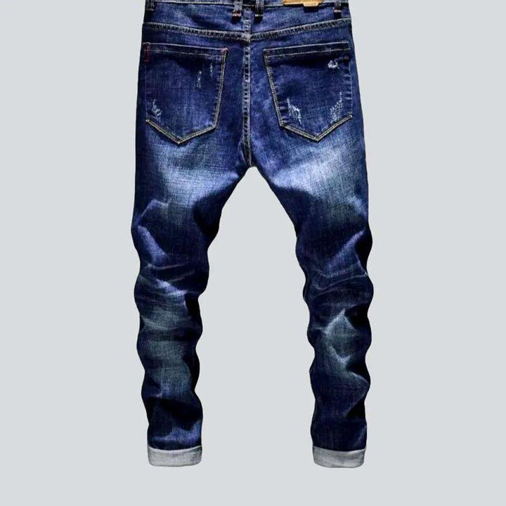 Denim blue ripped men's jeans