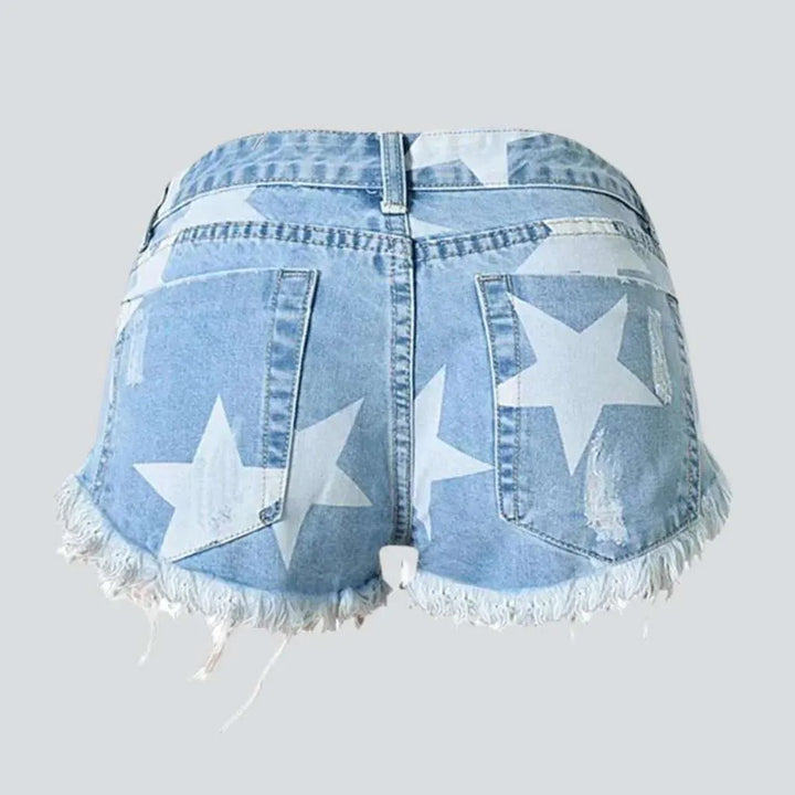 Star print distressed denim shorts