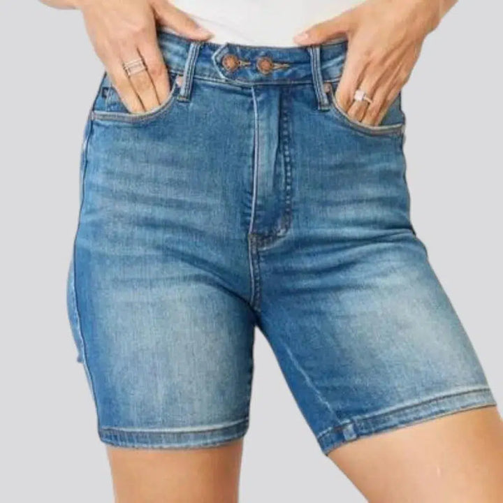 High-waist medium-wash jean shorts
 for women