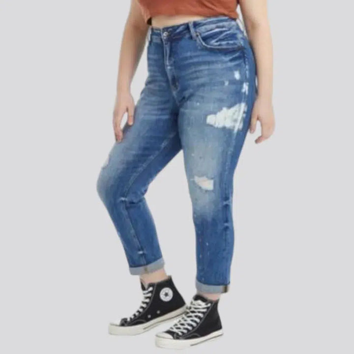 Distressed whiskered jeans
 for women