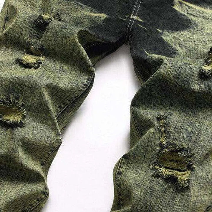 Green over-dyed distressed jeans