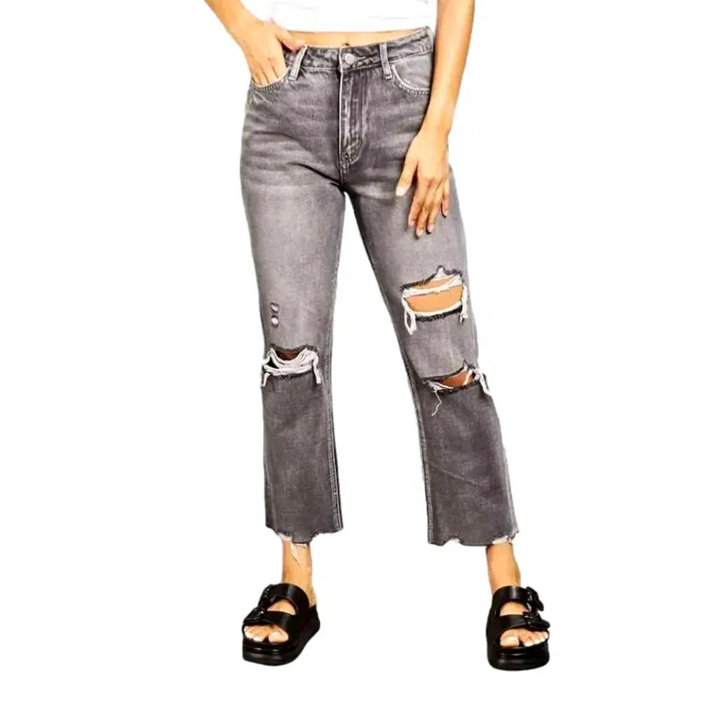 Grunge women's whiskered jeans