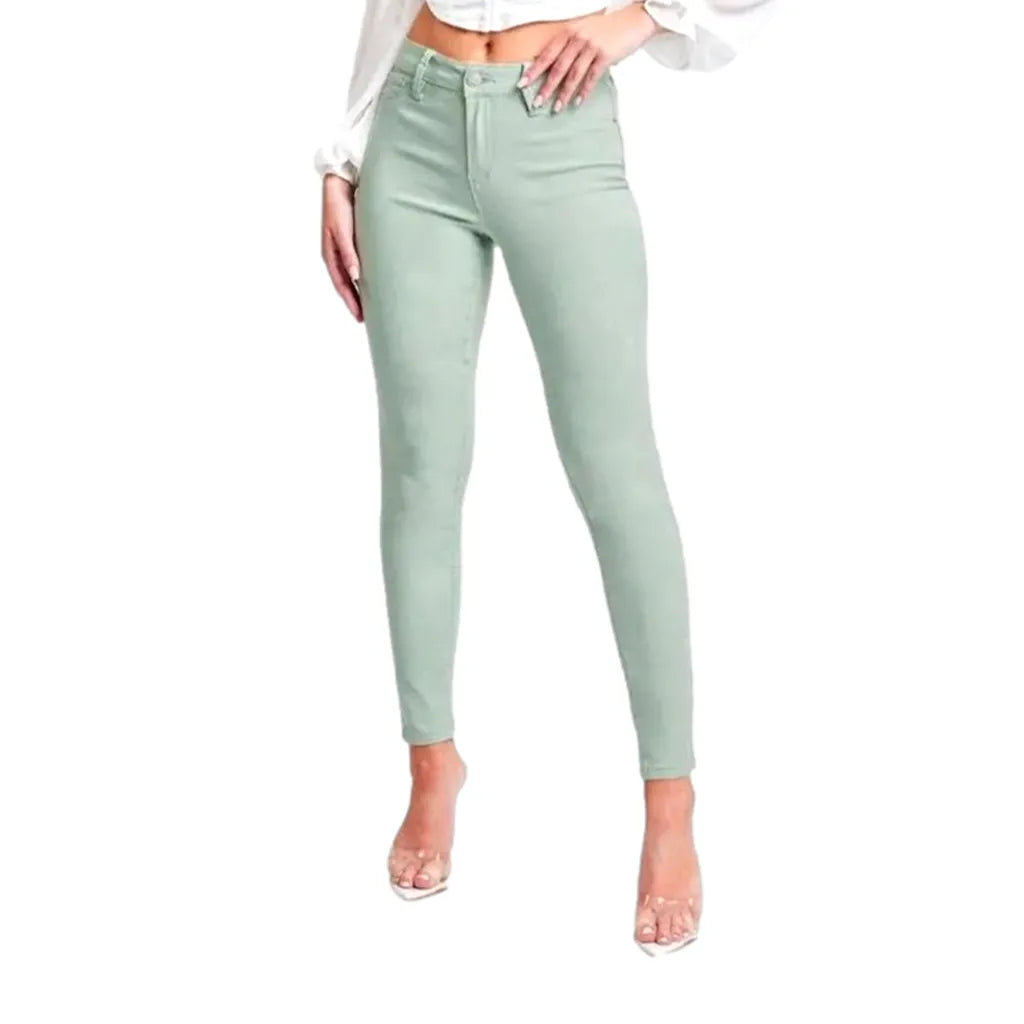 High-waist women's pale-green jeans