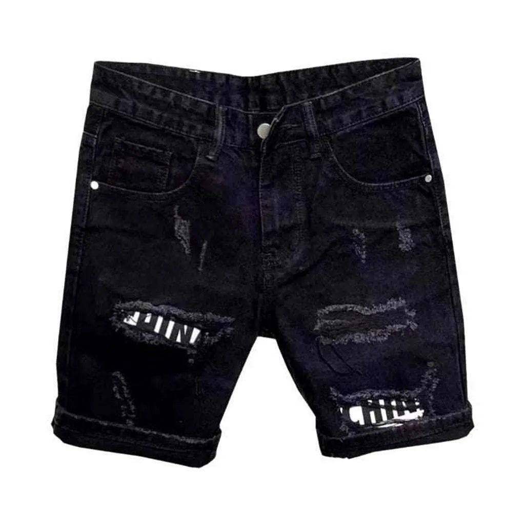 Inscribed patches distressed denim shorts