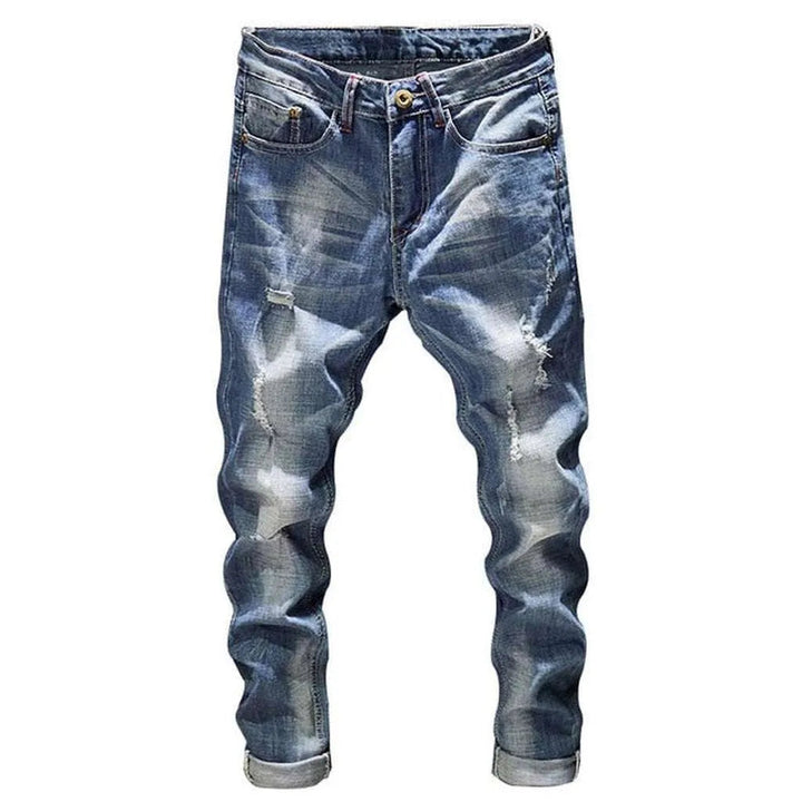 Light wash men's ripped jeans