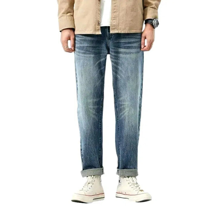 Medium-wash men's fashion jeans