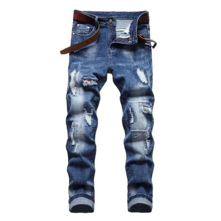 Medium wash ripped men's jeans
