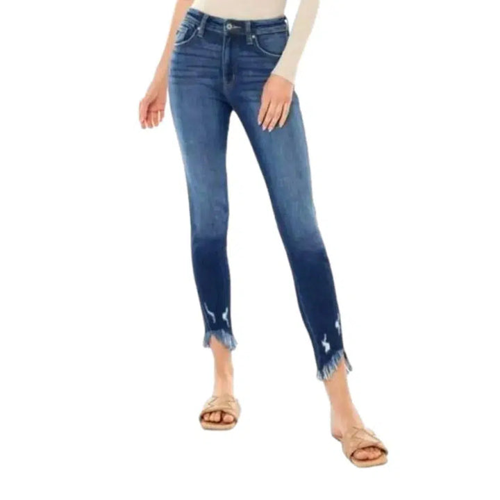 Medium-wash skinny jeans
 for ladies