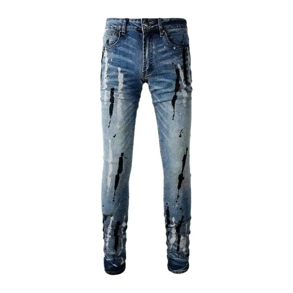 Painted men's light-wash jeans