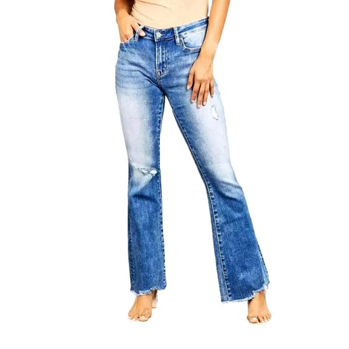 Raw-hem medium-wash jeans
 for ladies
