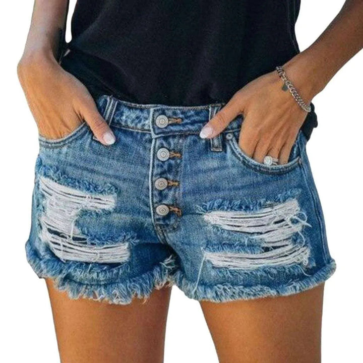 Ripped jeans shorts with buttons
