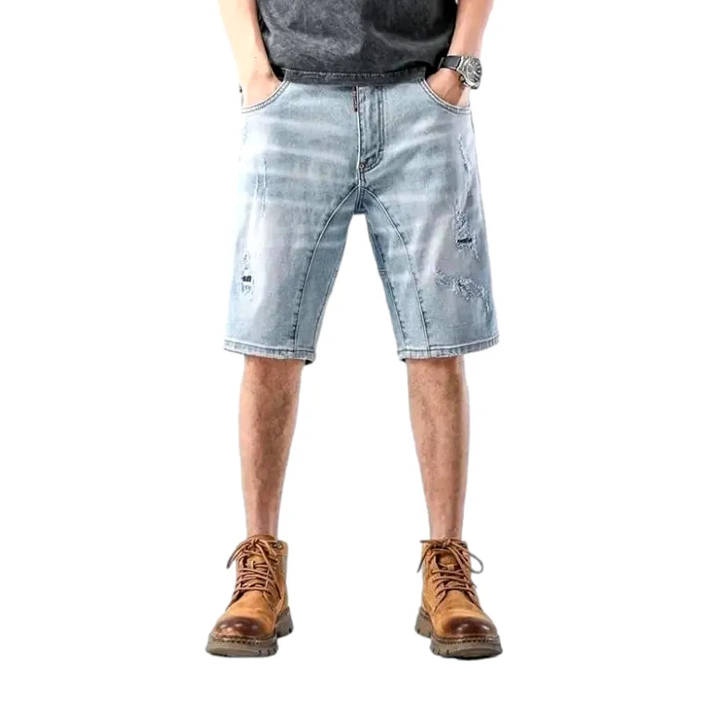 Sanded distressed denim shorts