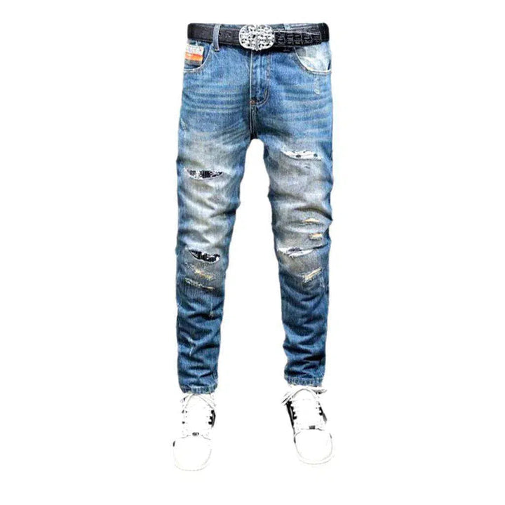 Small skulls embroidery jeans
 for men