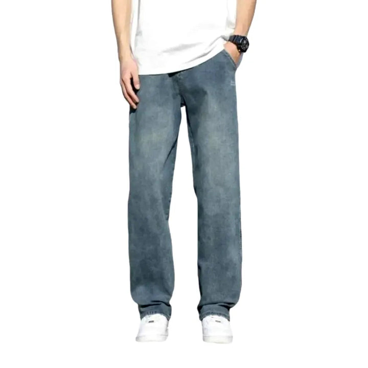 Stonewashed men's floor-length jeans