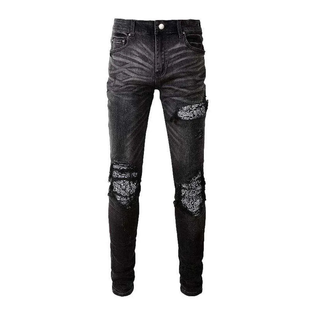 Vintage black ripped biker jeans