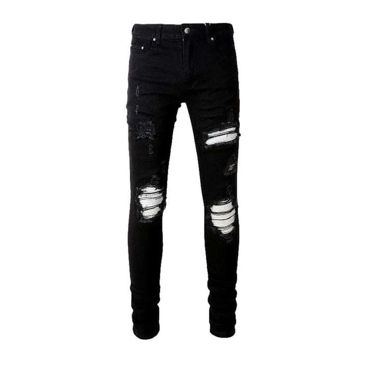 White patch ripped biker jeans